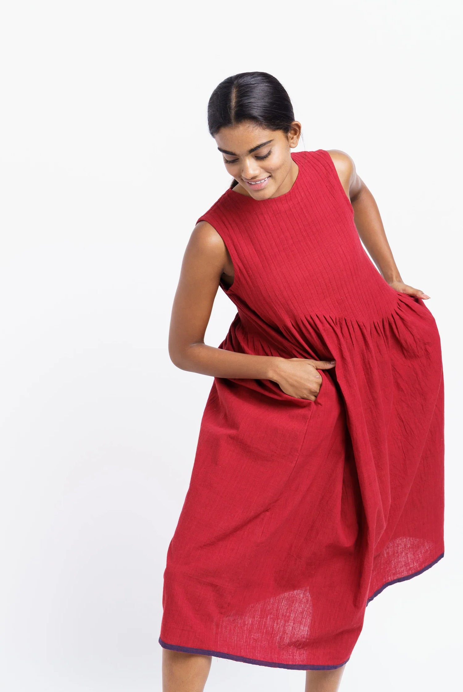 red pleated midi dress