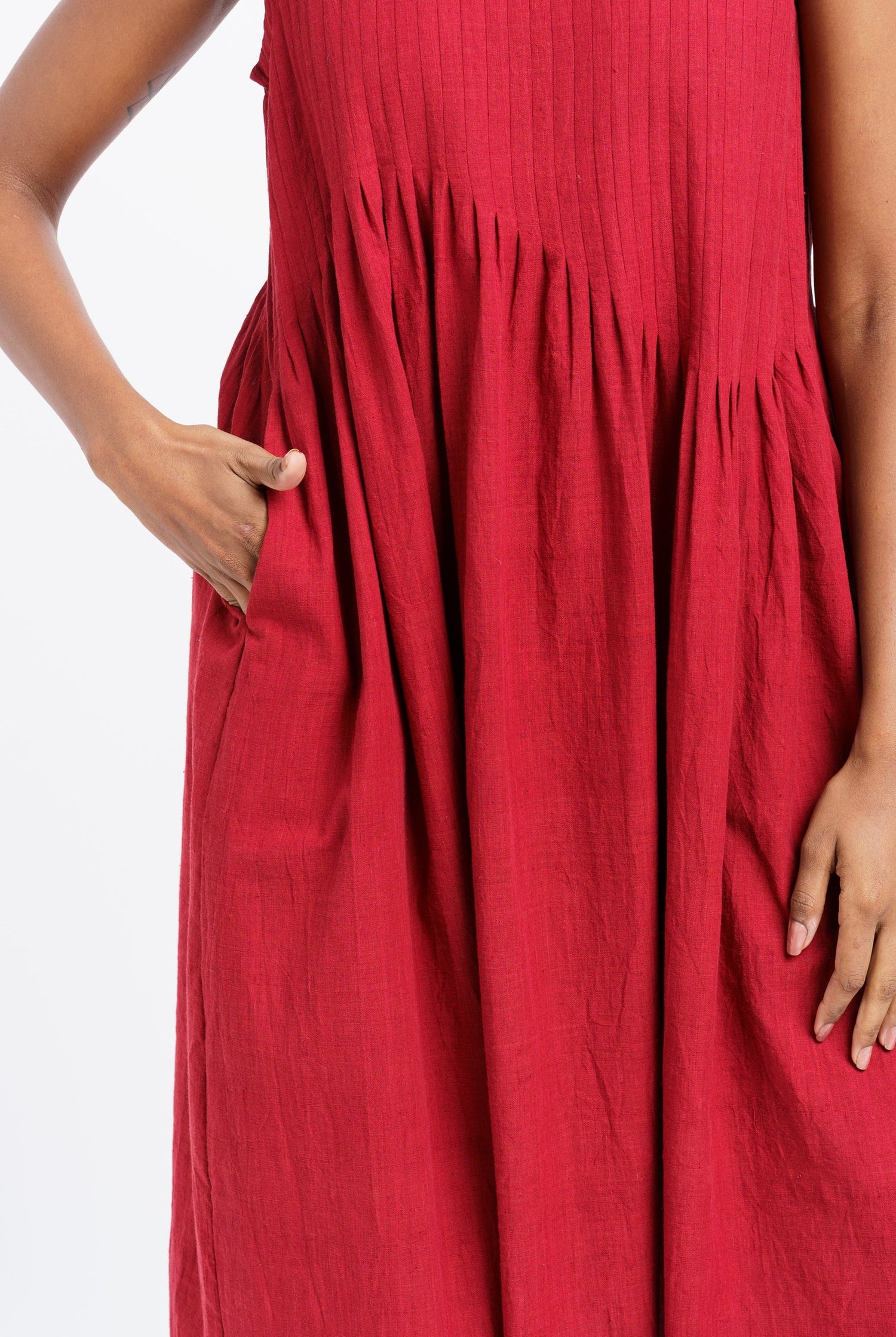 red pleated midi dress