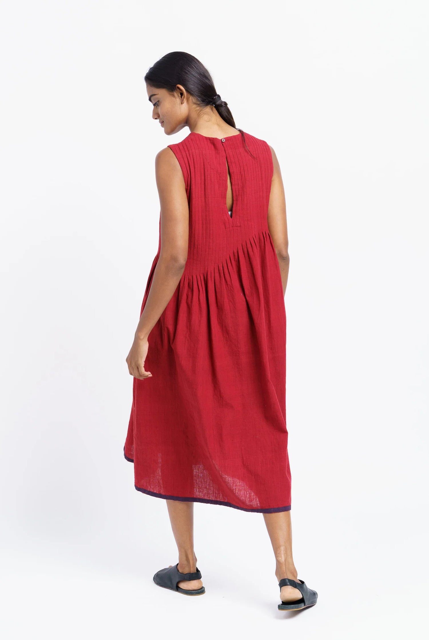 red pleated midi dress