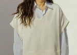corinne collection pico vest in ivory over a white button up top